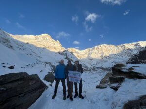 Trekkers holding banner of Intrekking at ABC