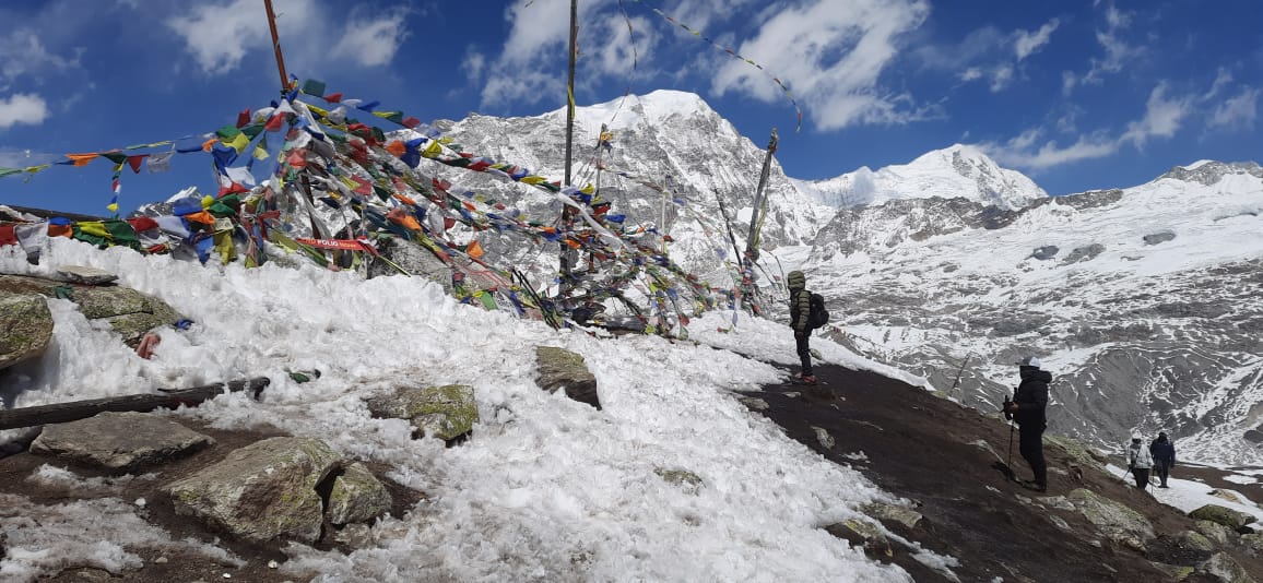 Trekkers on snowy Langtang trail