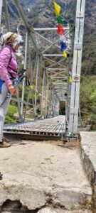 A trekker standing on the starting point of bridge 