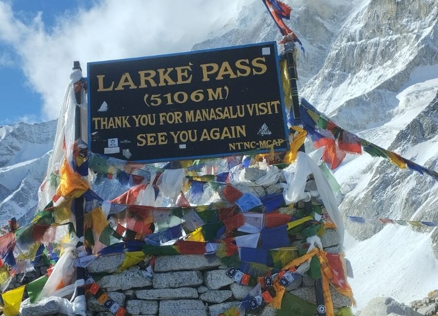 Larke Pass Point strewn with prayer flags